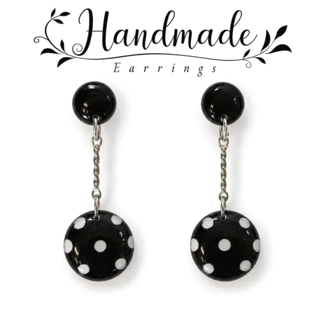 Boucles d'oreilles clous pendantes, Séville