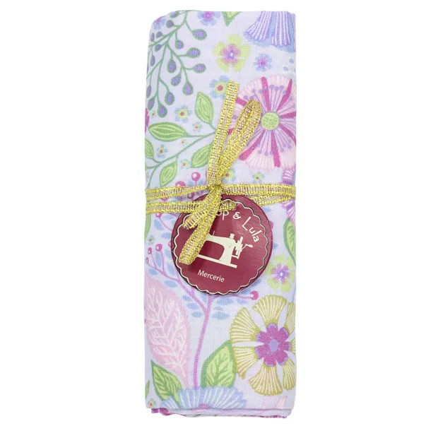 coupon tissu coton fleurs pastel sur fond bleu ciel